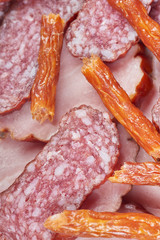 Pile of cold cuts. Mix of sausages