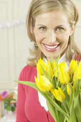 Woman with a bunch of flowers