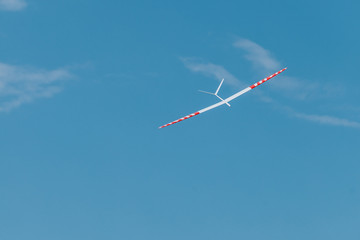 RC soaring plane on blue sky