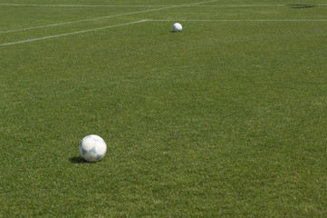 Balls on soccer field