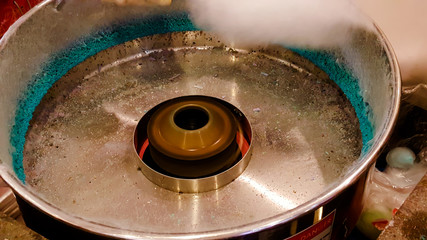 Candy floss machine with white candyfloss