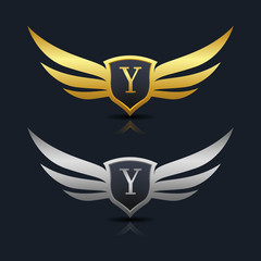 Obraz premium Wings Shield Letter Logo Template 