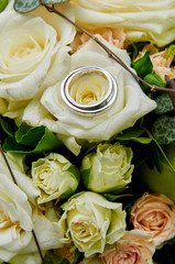 wedding bouquet with roses and rings