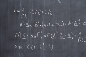 Blackboard with arithmetic's on it, close-up