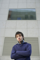 Obraz premium Shy young man looking up
