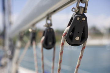 Rolls on a boom of a sailing yacht, close-up, differential focus