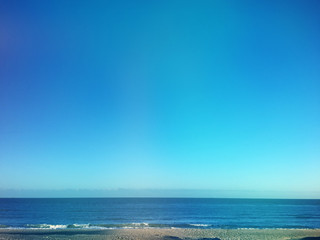Beautiful sky and beach in Knokke-Heist in winter morning time
