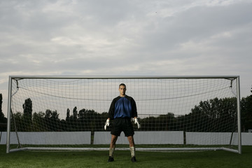Goalkeeper standing in a goal