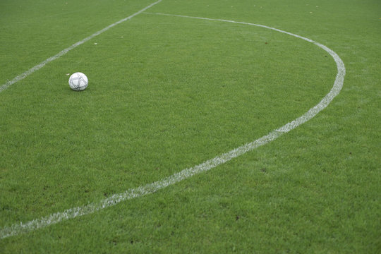 Football lying in a marked area, ready for direct free kick