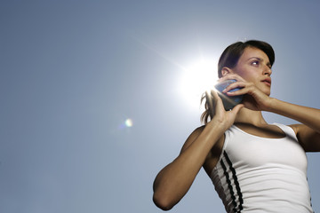 Woman making shotputting