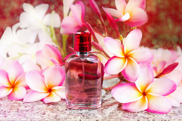 Single bottle of sweet pink fragrant perfume