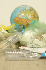 Recyclable waste and globe