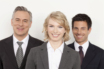 Fototapeta na wymiar Three confident businesspeople, Bavaria, Germany