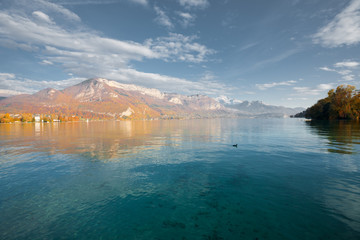Naklejka premium Lake Annecy at French Alps Autumn Colors in France. Horizontal