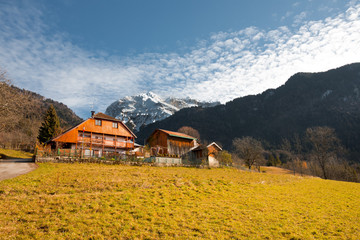 French Alps Mountain and Traditional Wooden Chalet near Annecy, France. Horizontal