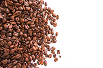 Coffee beans on white. Top view. Copy space.