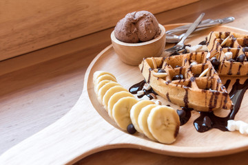 Belgian waffles with fruit and chocolate, forest fruit, all homemade, delicious batter