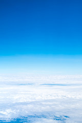 Blue sky and Cloud Top view from airplane window,Nature background