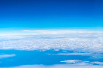 Blue sky and Cloud Top view from airplane window,Nature background
