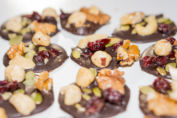 Chockolte cookies full of nuts, seeds and dried fruits