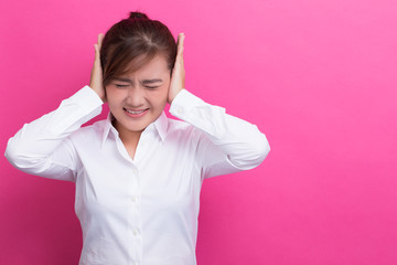 Asian woman close her ears