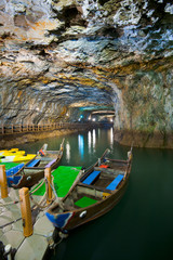 Fototapeta na wymiar Beihai Tunnel Military Cave Docked Tourist Boats on Nangan Island in Matsu, Taiwan