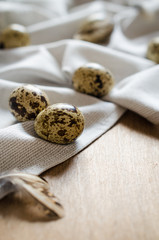 Fresh Organic Quail Eggs on Wooden Table.