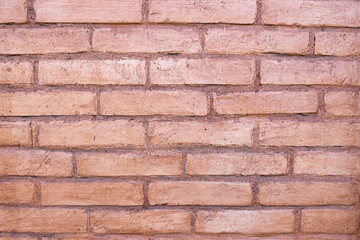 background of old brick wall close-up shows every brick