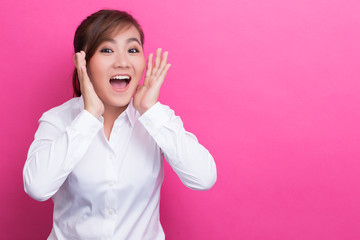 Happy asian woman make the shouting gesture