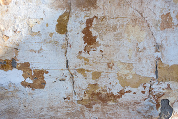 texture and background old wall cracks and peeling paint