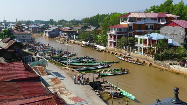 Many boats in Nyaung Shwe on Inle lake, Myanmar (Burma), timelapse, 4k
