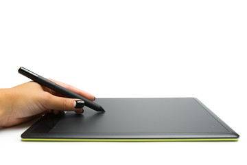 Graphic tablet with pen and hand for illustrators and designers, isolated on white background