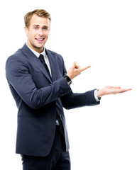 businessman showing something or copyspase