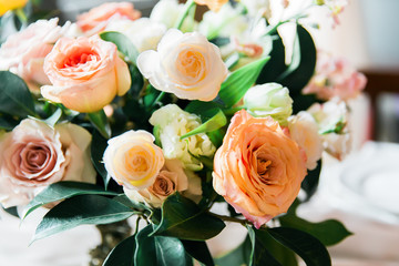 Floristics with roses and ranunculus. Wedding decor