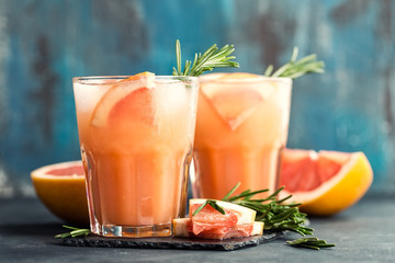 Grapefruit and rosemary gin cocktail or margarita, refreshing drink with ice