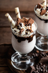 delicious milkshake with ice cream, chocolate and cookies