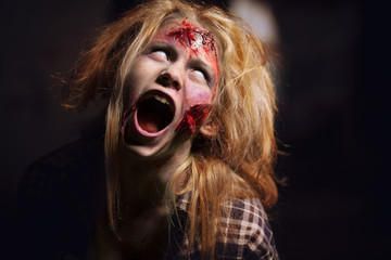 Zombie girl. Girl with a broken face.
