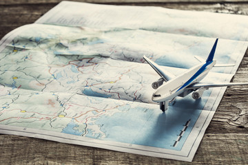 Travel concept on wooden table - obrazy, fototapety, plakaty