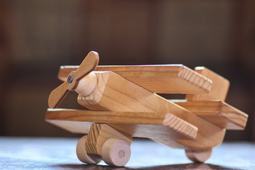 wooden toy airplane on the table