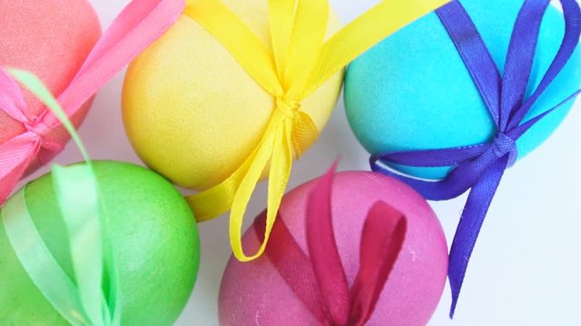 colored Easter eggs with ribbons