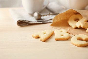 Cookie alphabet on kitchen table, closeup