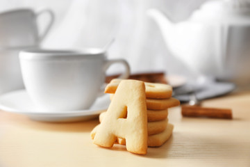 Cookie alphabet on kitchen table, closeup