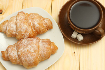fresh croissant with coffee