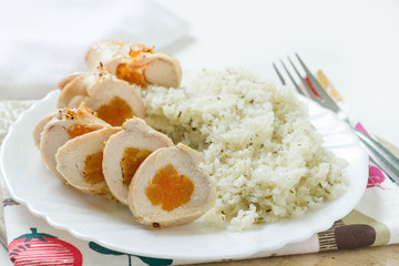 Chicken filled with dried fruits. Cauliflower rice for side dish.