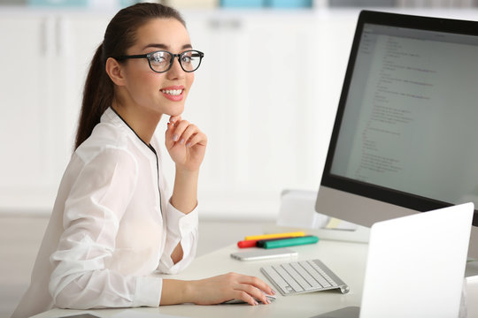 Young woman working at office