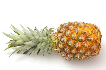 Ripe pineapple isolated on white background