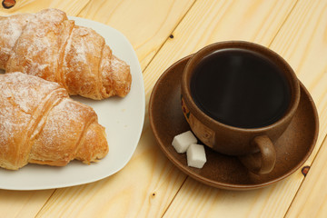 fresh croissant with coffee