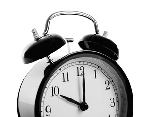 Alarm clock on white background, closeup