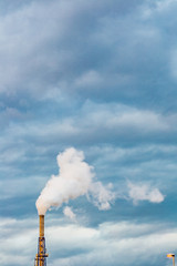 Smoke coming out of a smokestack