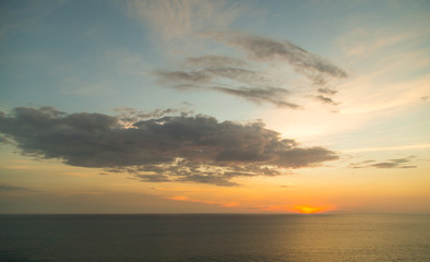 Naklejka na ściany i meble Beautiful tropical sunrise in the sea.